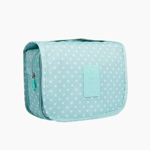 Trousse de toilette femme à suspendre vert points - À vos trousses